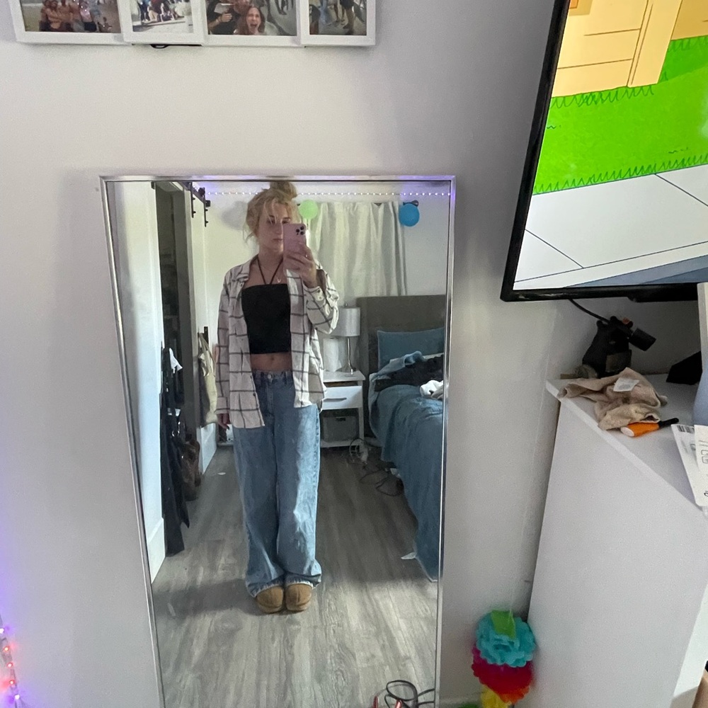 Plaid Shirt with Black Top and Blue Jeans